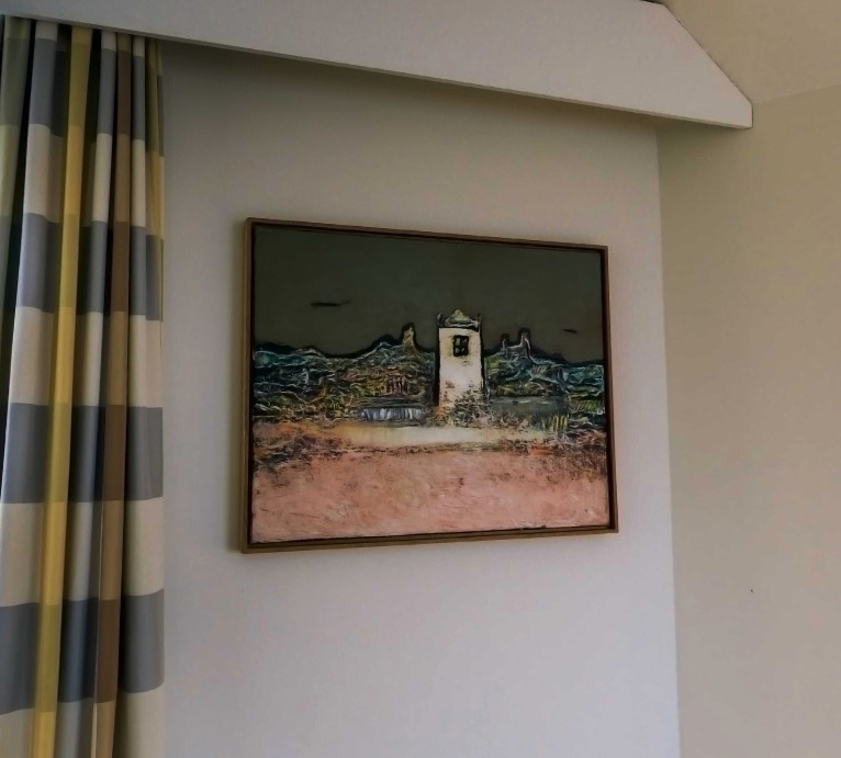 Framed painting on the wall